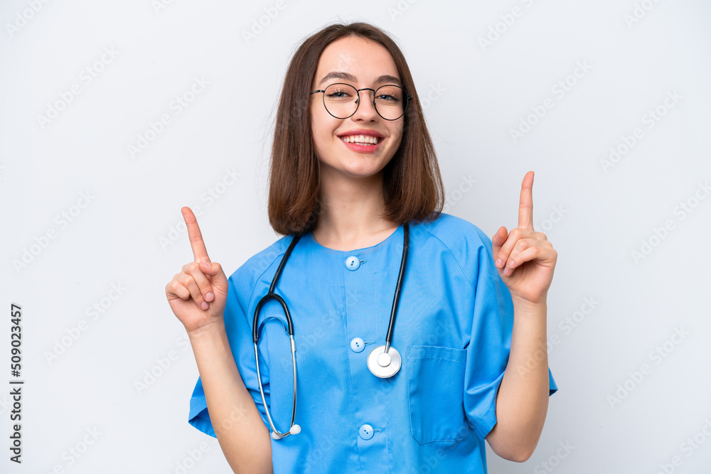 Young nurse Ukrainian woman isolated on white background pointing up a great idea Young nurse Ukrainian woman isolated on white background pointing up a great idea