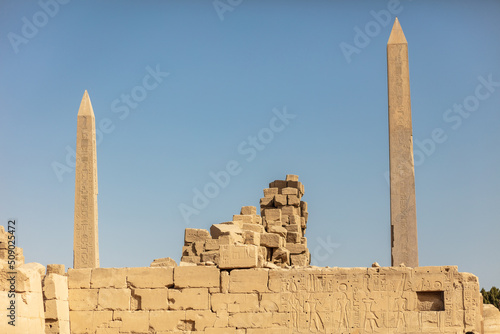 Different hieroglyphs on the walls and columns in the Karnak temple. Karnak temple is the largest complex in ancient Egypt.