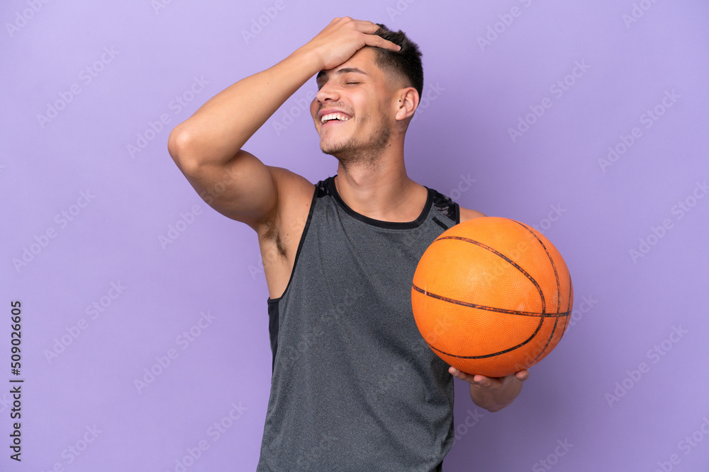 young caucasian woman  basketball player man isolated on purple background has realized something and intending the solution