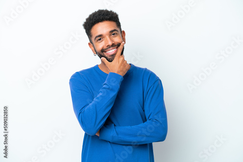 Young Brazilian man isolated on white background happy and smiling