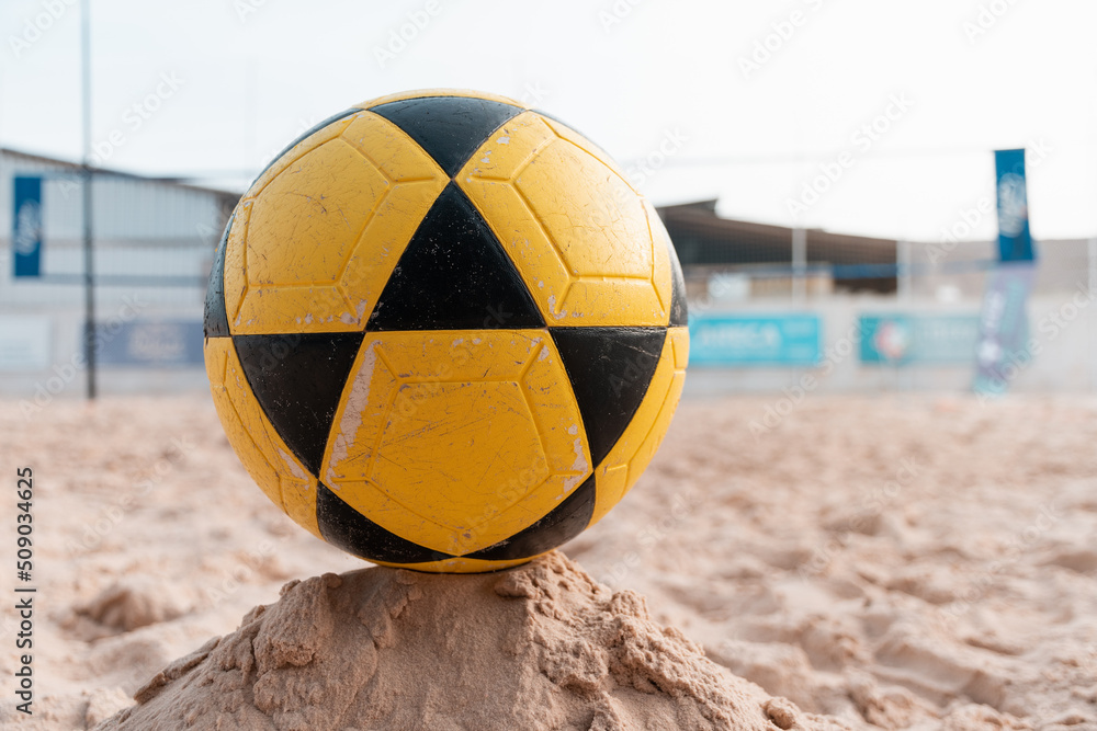 Beach soccer ball on the beach sand