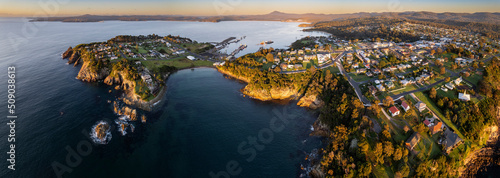 Dawn aerial panorama of the coastal town of Eden, NSW Australia