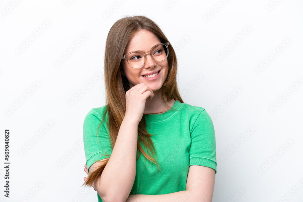 Young caucasian woman isolated on white background With glasses and thinking while looking up Young caucasian woman isolated on white background With glasses and thinking while looking up