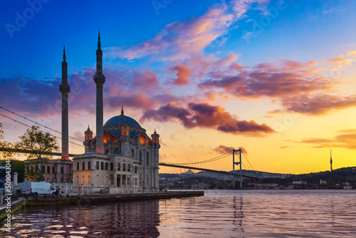 The Bosphorus Bridge and the Ortakoy Mosque during twilight sunset in Istanbul, Turkey