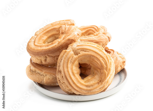 Ring-shaped homemade eclairs isolated on white