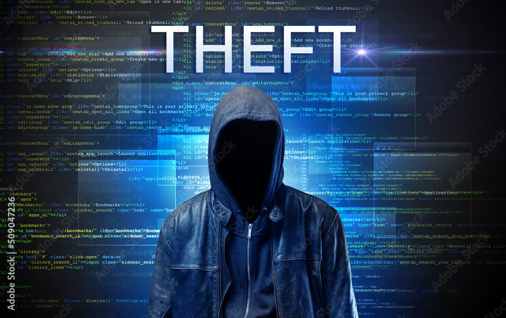 Faceless hacker on code background Faceless hacker on code background