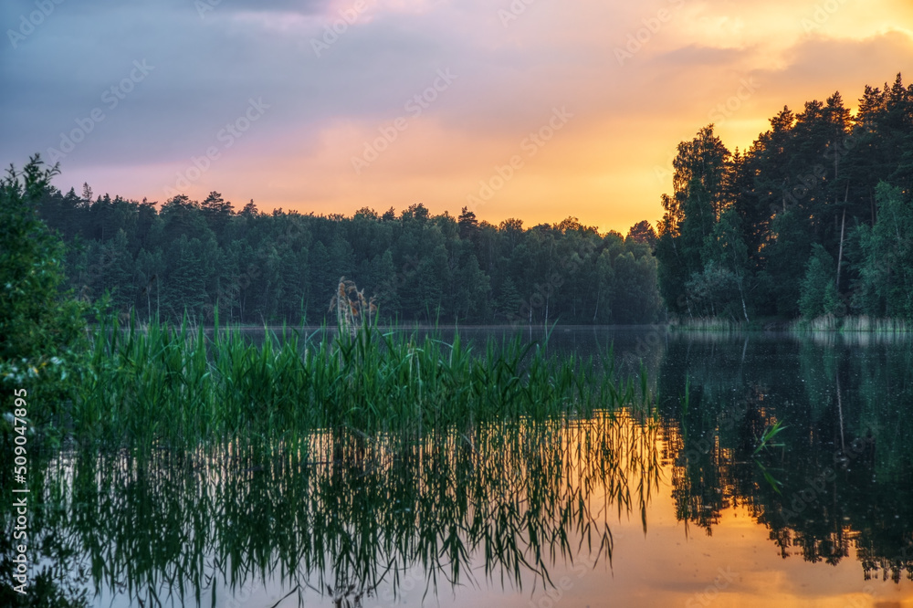Sunset around the summer lake Sunset around the summer lake