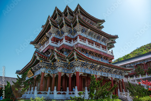 Chinese traditional southern temple on Tianmen mountain, Zhangjiajie, Hunan, China. Blue sky with copy space for text photo