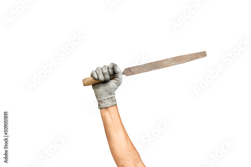 Hand holding a steel Old rusty file (rasp), isolated on white background. photo