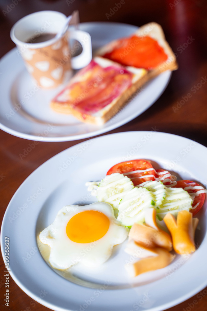 fried egg with sausage for breakfast fried egg with sausage for breakfast