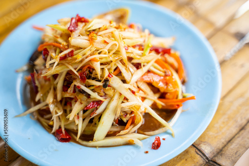 very spicy papaya salad with Fermented Fish