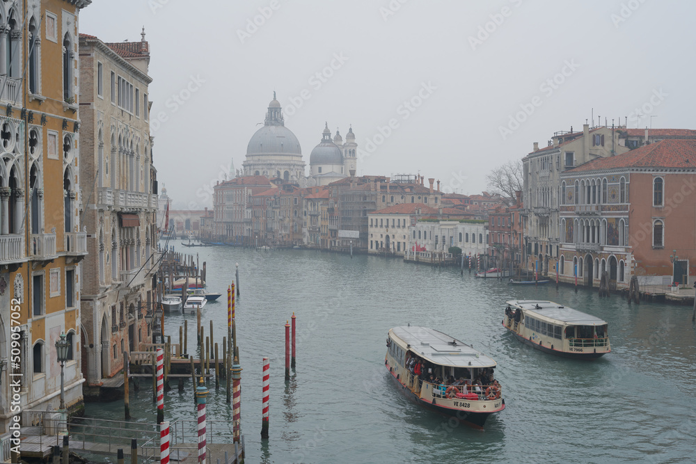Fog in Venice. Canal Grande in Venice High Angle Aerial view. Public Transport Boat