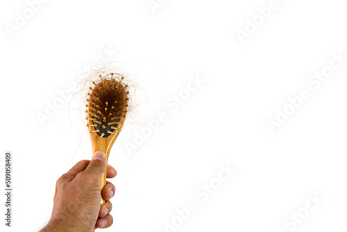Brown hair, hair loss every day, serious problems and hair loss on a white background.