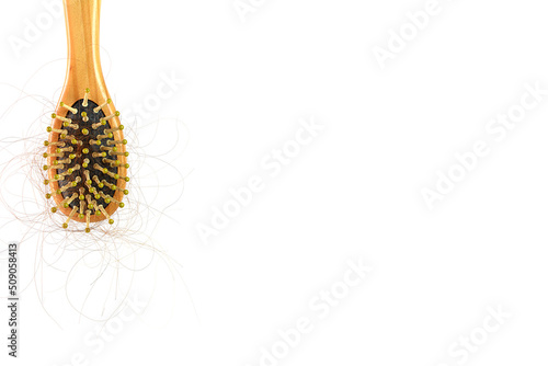 Brown hair, hair loss every day, serious problems and hair loss on a white background.