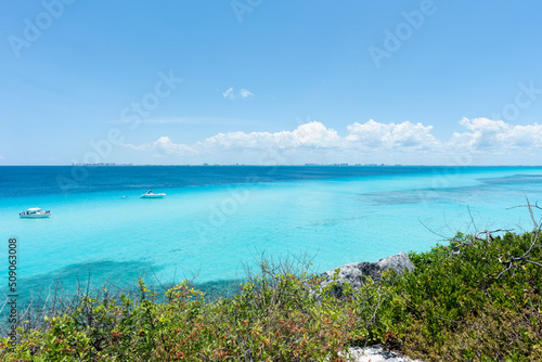 Panoramic sea views with luxury yachts anchored in the bay Garrafon Park  Isla Mujeres in Mexico.