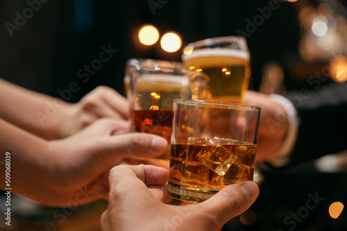 Bild auf Leinwand Celebrate whiskey on a friendly party in  restaurant