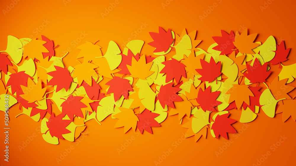 秋に紅葉する植物。紅葉とイチョウの葉。オレンジ色の背景。落ち葉のイメージ画像。