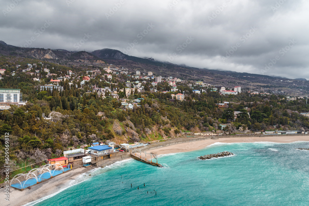 View from a rock Diva at city beach on cloudy weather. Simeiz, Crimea