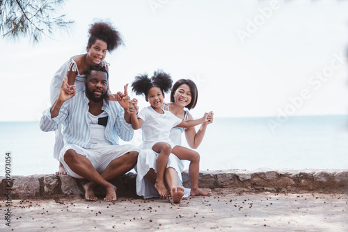 Happy African American family enjoying together. Vacation relax time concept.