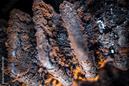Tar and soot inside a solid fuel boiler after the heating season close-up