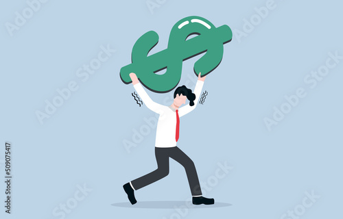 Financial burden, bearing high expenses or cost of 
living due to economic crisis or inflation, debt or loan concept. Exhausted businessman carrying heavy dollar sign on his shoulder. 