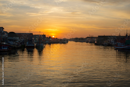 at the river in the evening The sun is setting on the horizon