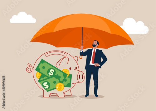 Investor with his  piggy bank safety money covered by big umbrella. Insurance and finance saving protection in economy crisis, safety investment or all weather portfolio.