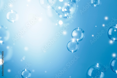 Beautiful Shiny Transparent Blue Soap Bubbles Background. Soap Sud Bubbles Water. 