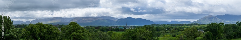 wide scenic panorama of the Magnetron Mountain Group in Killarney National Park with the mountain tops in the clouds