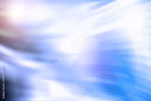 Abstract blue background. Blurred background with curved lines blue tint. © alexkich