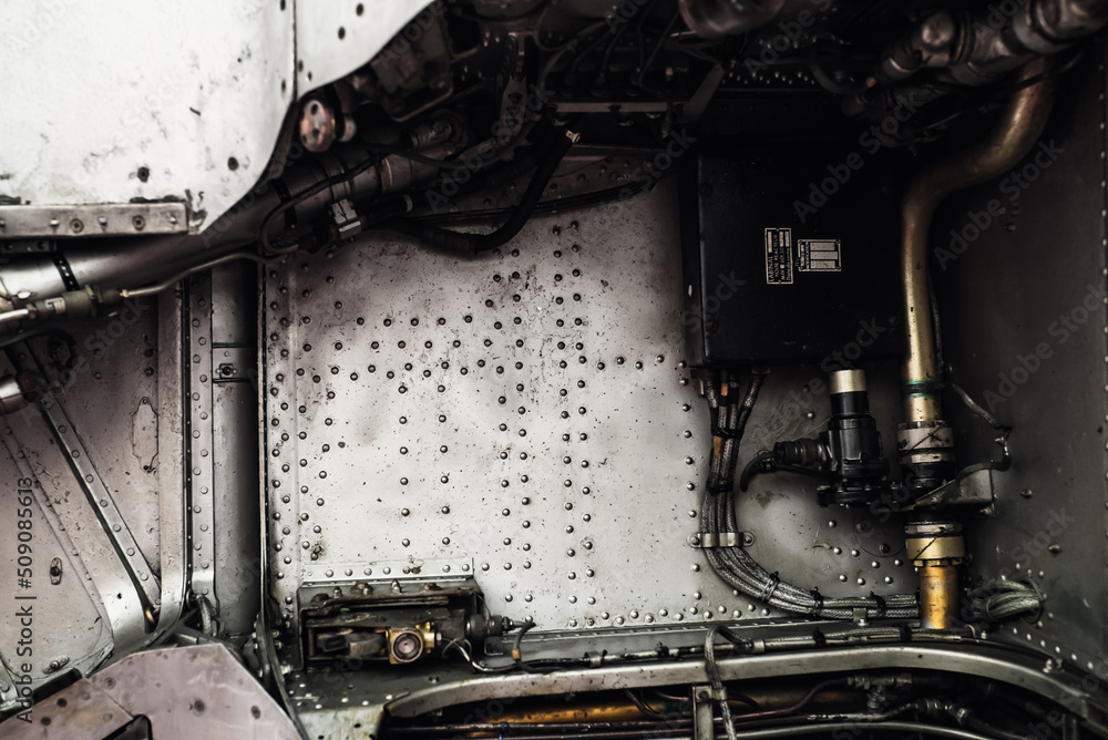 Aluminum surface of the aircraft fuselage. Sheet metal riveted ...
