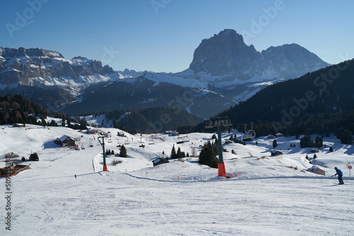 Ski slopes on Seceda in Val Gardena, Sassolungo mountain in background.