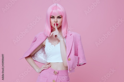 Canvas-taulu Beauty Fashion woman in a pink suit gesturing with his hands emotions fun color