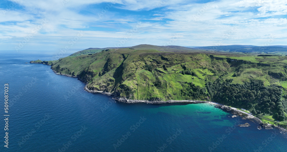 Aerial photo of Murlough Bay by the Atlantic Ocean on North Coast Antrim Northern Ireland