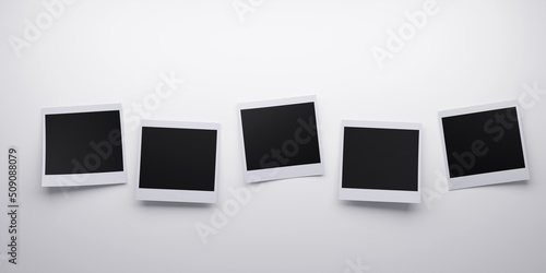 Several blank polaroid style instant photo print frames. 3d rendering