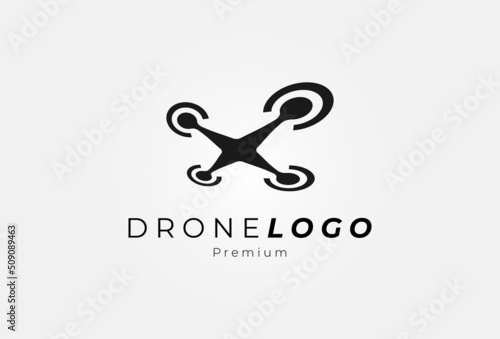 Drone logo,minimalist flying drone logo with perspective view from below, flat design logo template, vector illustration