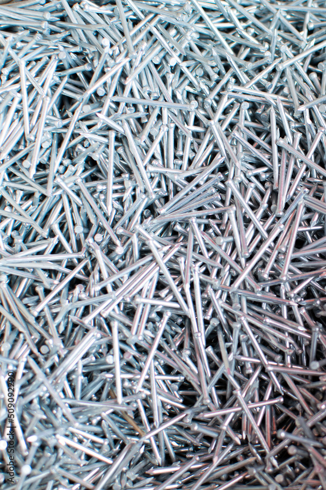 Background of small nails.Building materials in stores Background of small nails.Building materials in stores