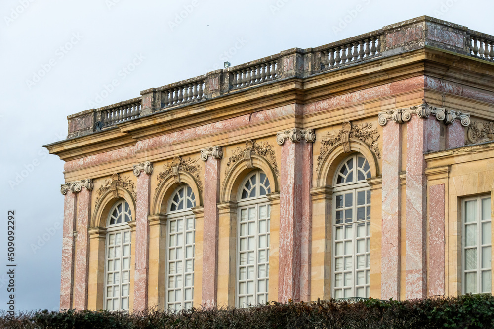 facade of the royal castle of versailles