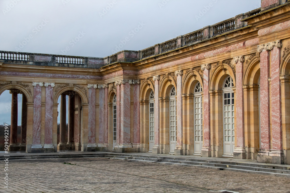 facade of the royal castle of versailles