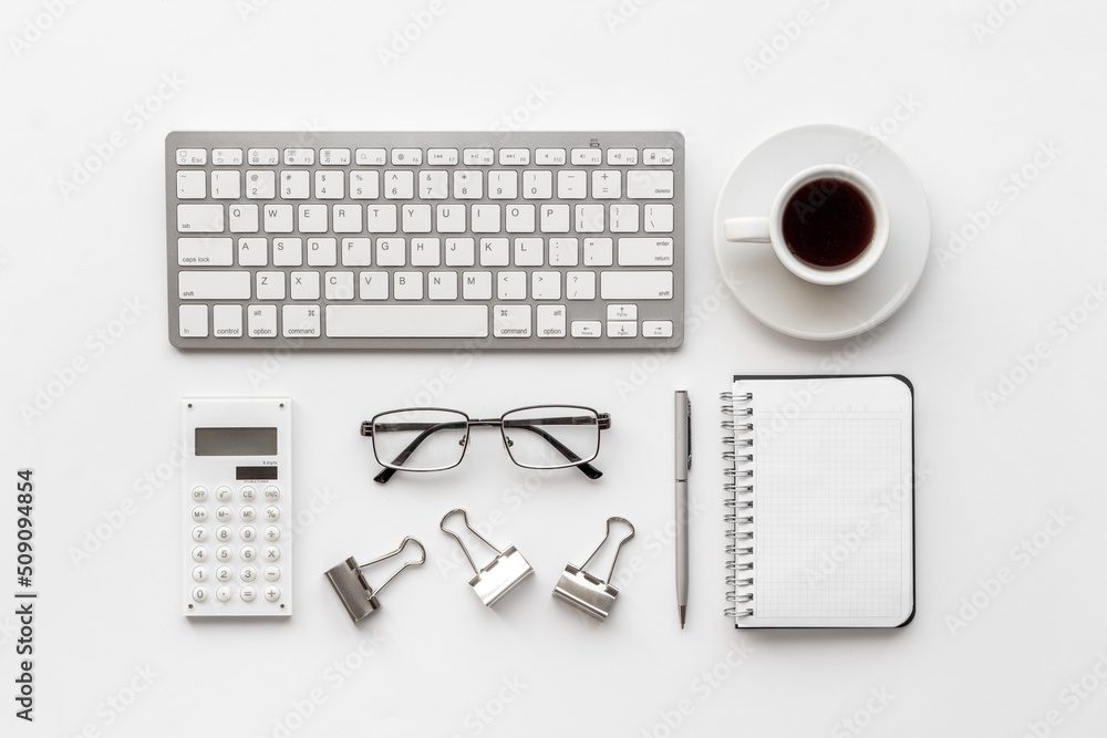 Layout of blogger or designer desktop with computer in monochrome style Layout of blogger or designer desktop with computer in monochrome style