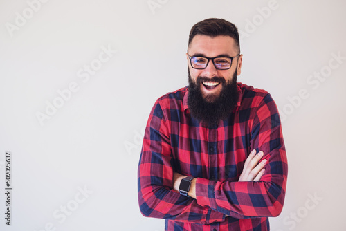 Portrait of happy man who is laughing. Copy space on image for your text or advert. © djoronimo