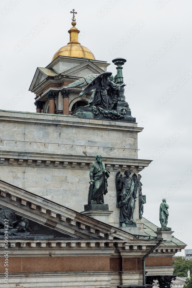 Details of the eastern facade of St. Isaac's Cathedral in St. Petersburg, bronze sculptures, St. Isaac of Dalmatia stops Emperor Valens