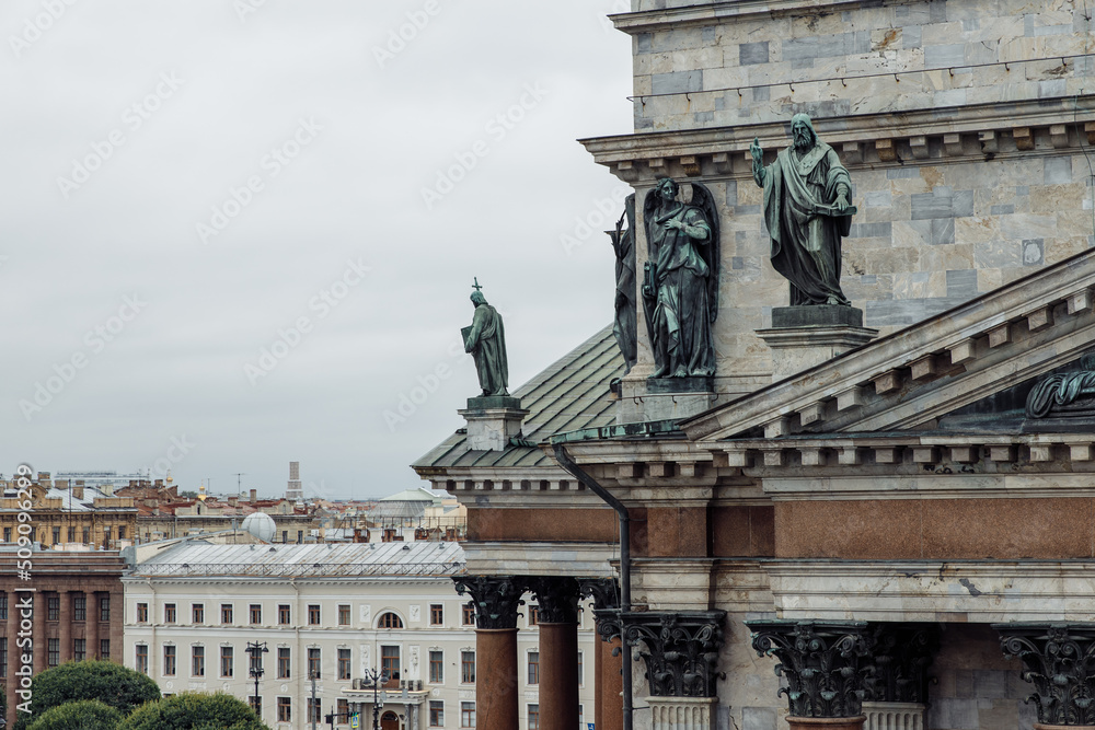 Obraz premium Details of the eastern facade of St. Isaac's Cathedral in St. Petersburg, bronze sculptures, St. Isaac of Dalmatia stops Emperor Valens