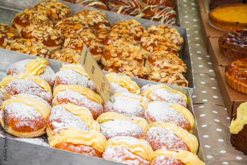 An assortment of berliners, German doughnuts, on display at Broadway Market in East London photo