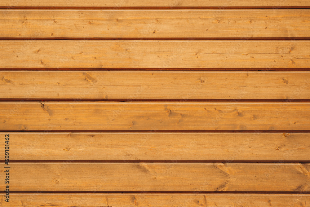 Texture wooden background. Horizontal yellow boards, outdoor fence Texture wooden background. Horizontal yellow boards, outdoor fence