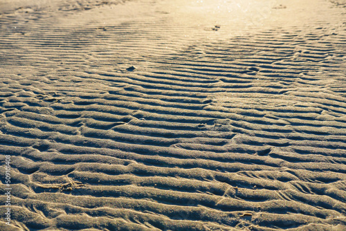 Ripped sand surface pattern abstract. High angle view. photo