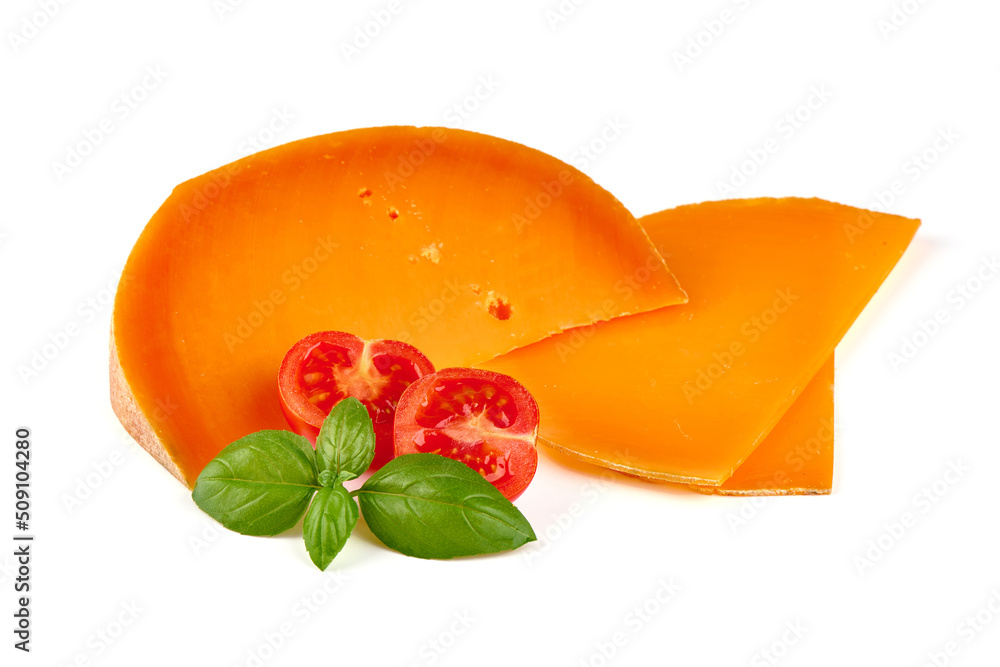 © GSDesign - Piece and slices of cheddar cheese with basil and red cherry tomatoes isolated on white background © GSDesign - Piece and slices of cheddar cheese with basil and red cherry tomatoes isolated on white background