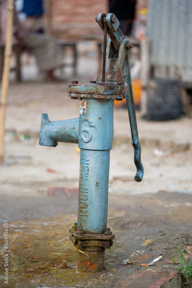 manually operated water pump (retro) style in a Bangladeshi village
manually operated water pump (retro) style in a Bangladeshi village