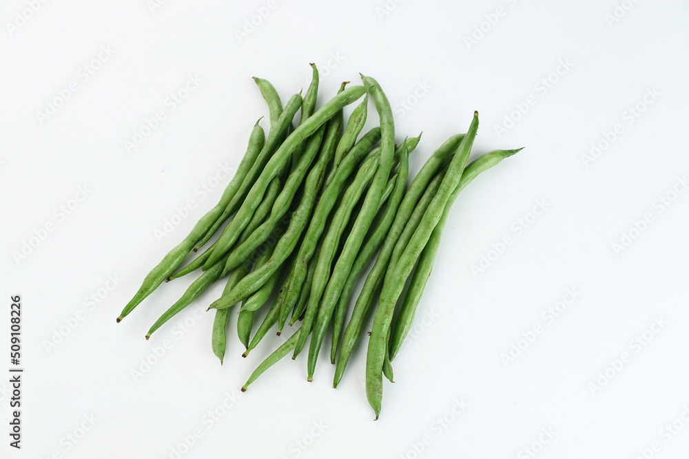 Buncis or Fresh raw string bean, legumes contain protein on white background.
Buncis or Fresh raw string bean, legumes contain protein on white background.