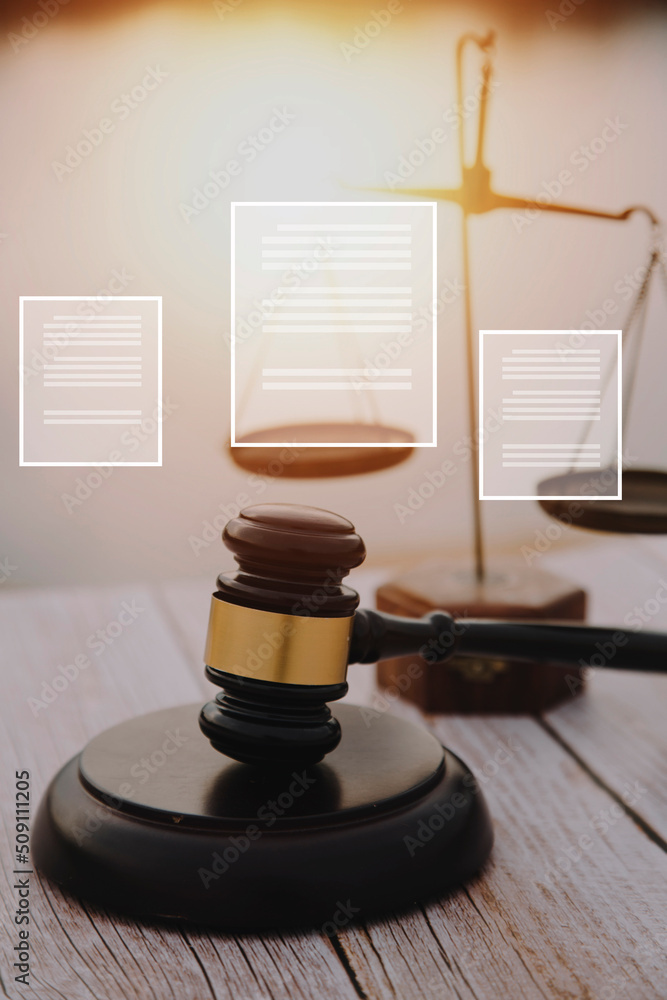 justice and law concept.Male judge in a courtroom on wooden table and Counselor or Male lawyer working in office. Legal law, advice and justice concept. justice and law concept.Male judge in a courtroom on wooden table and Counselor or Male lawyer working in office. Legal law, advice and justice concept.